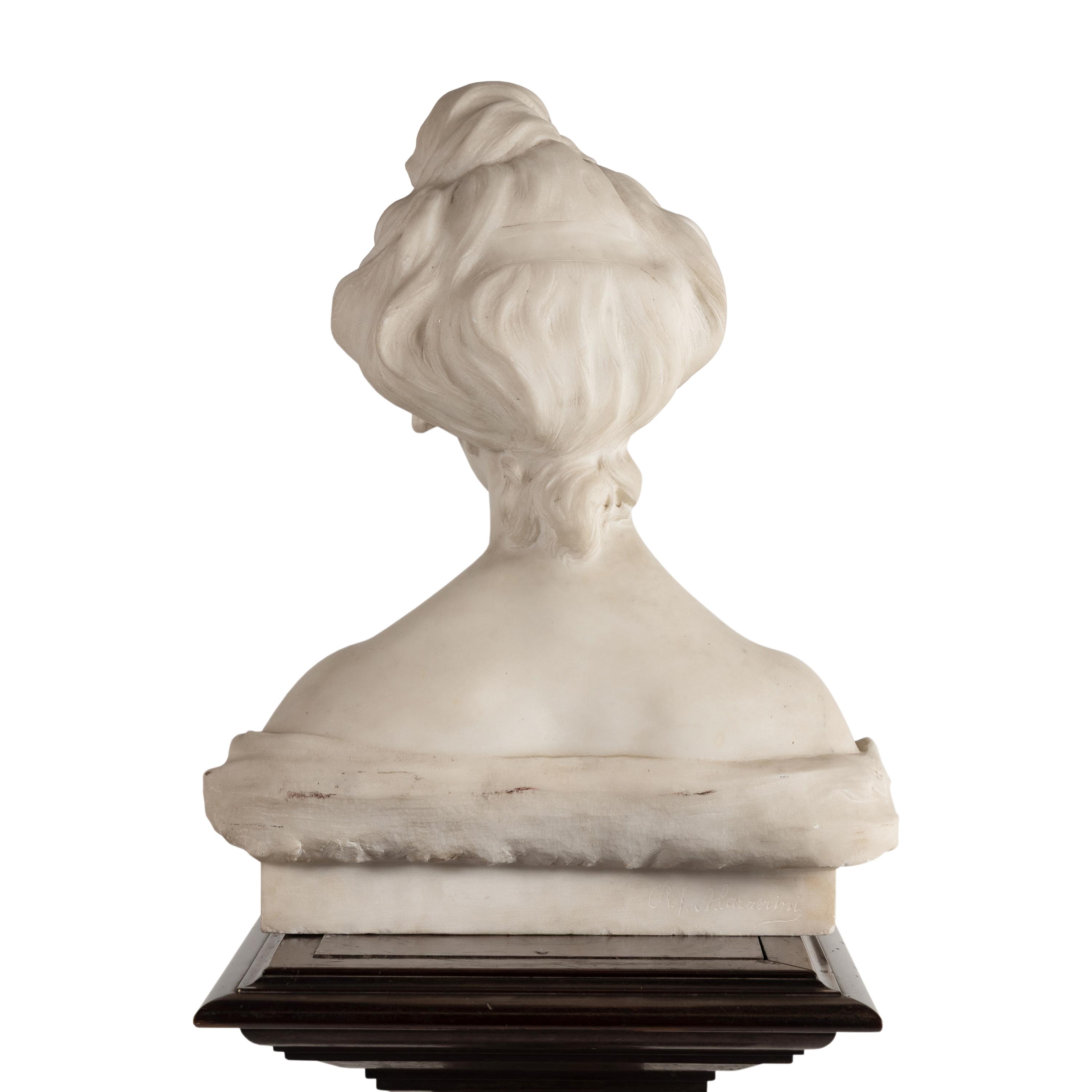 An Italian Carved Marble Bust of a Young Woman