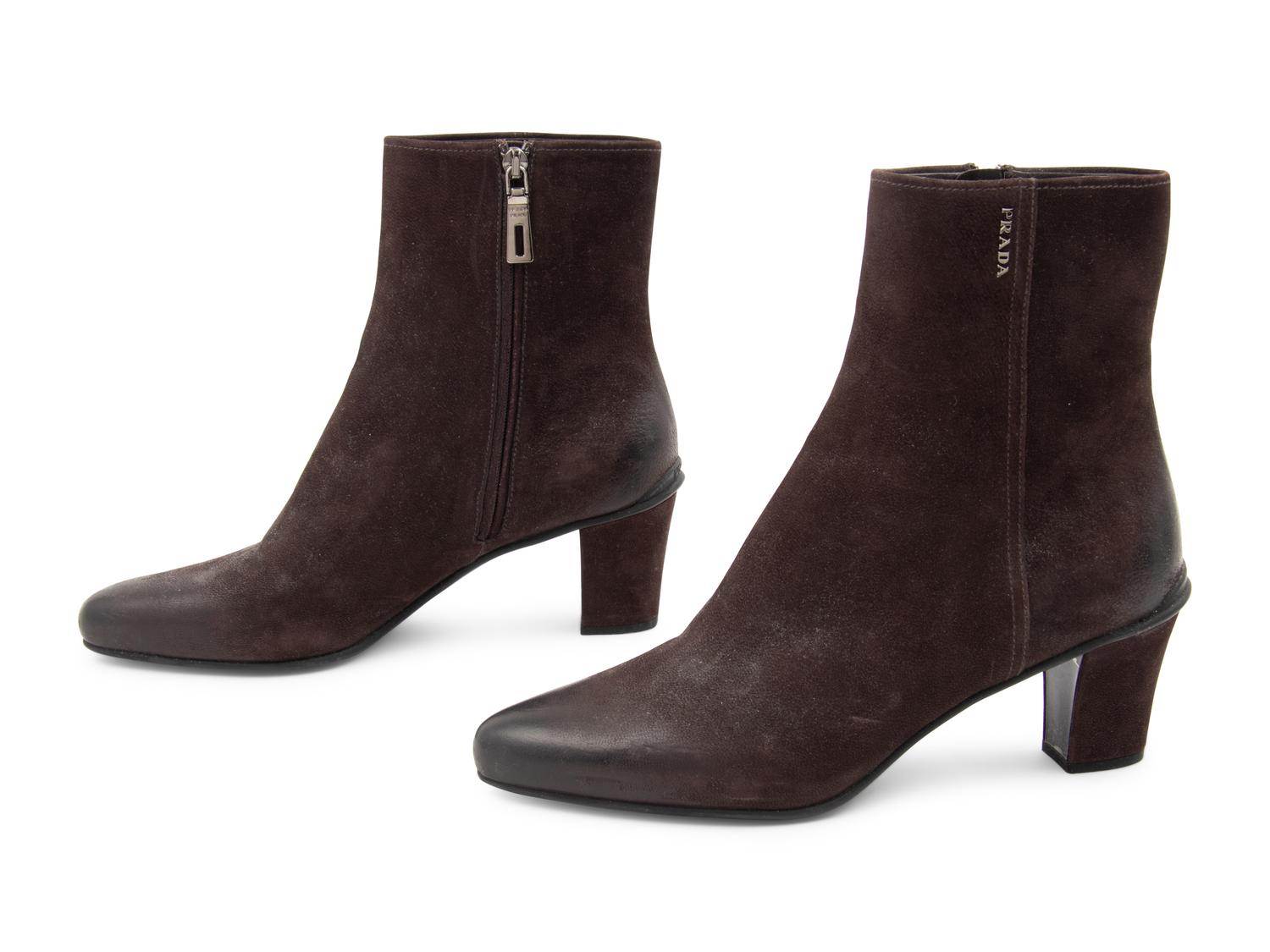 Three Pairs of Designer Boots: One Chanel, One Prada, One Celine