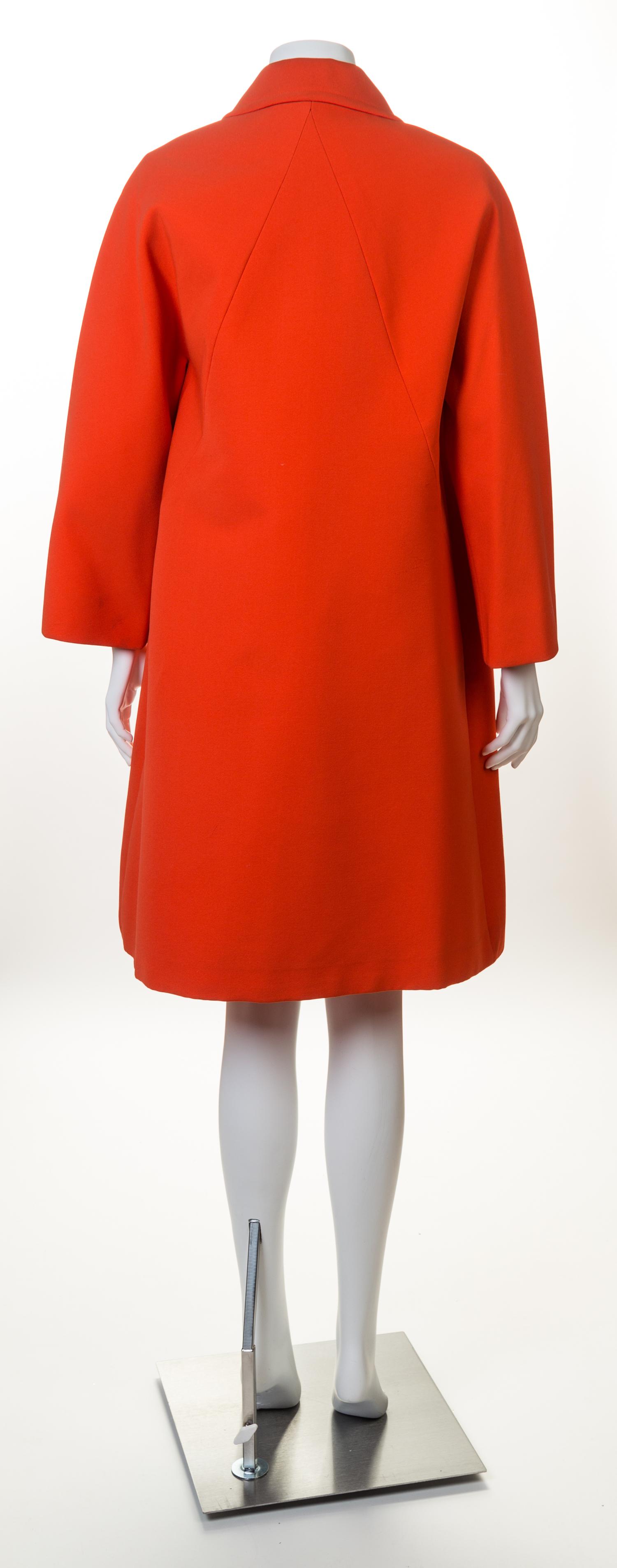 A Givenchy 1970s Orange Techno Coat, No size.
