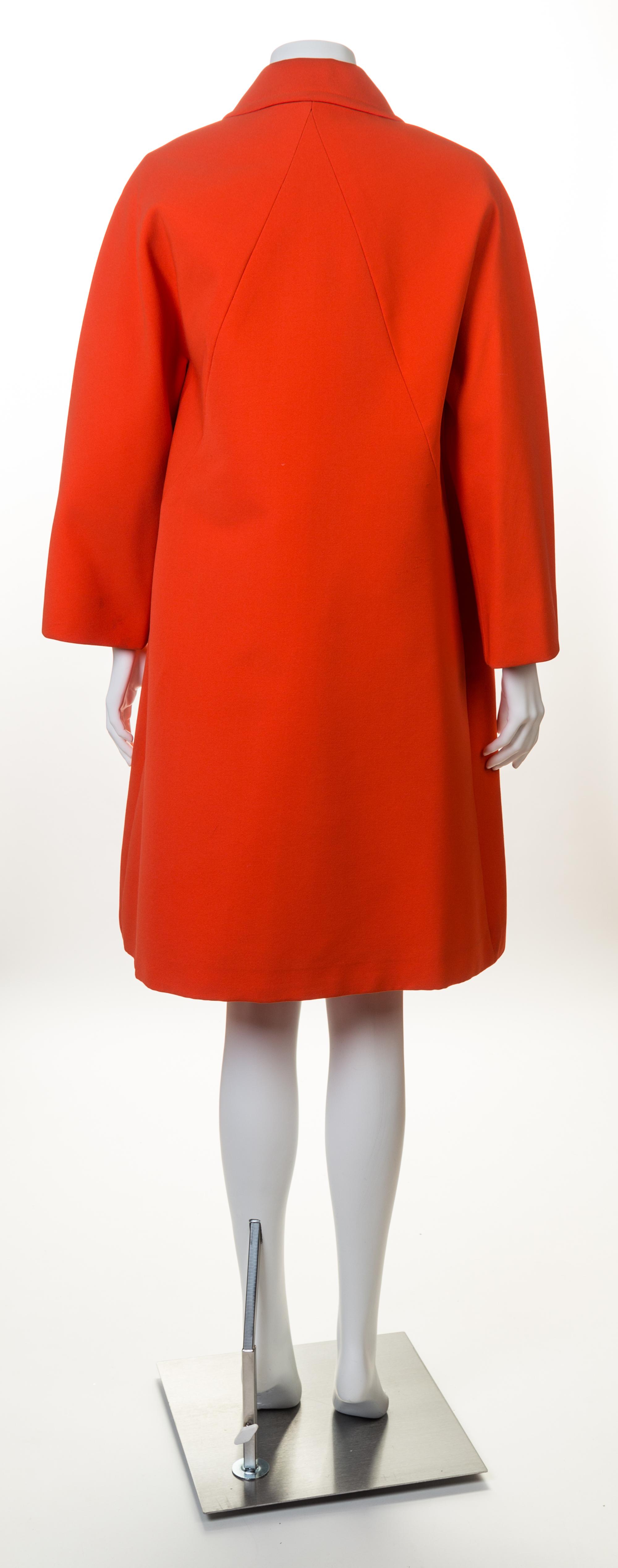 A Givenchy 1970s Orange Techno Coat, No size.