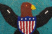 A Pair of Plateau Beaded Hide Moccasins