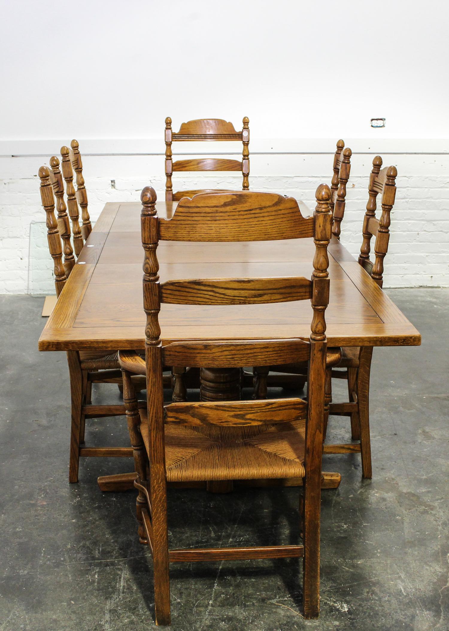 An American Oak Dining Set Height of armchairs 46 inches. — SECOND HALF 20TH CENTURY