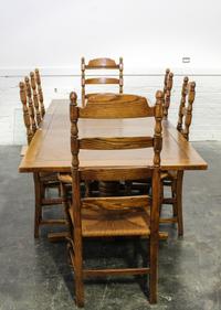 An American Oak Dining Set Height of armchairs 46 inches. — SECOND HALF 20TH CENTURY