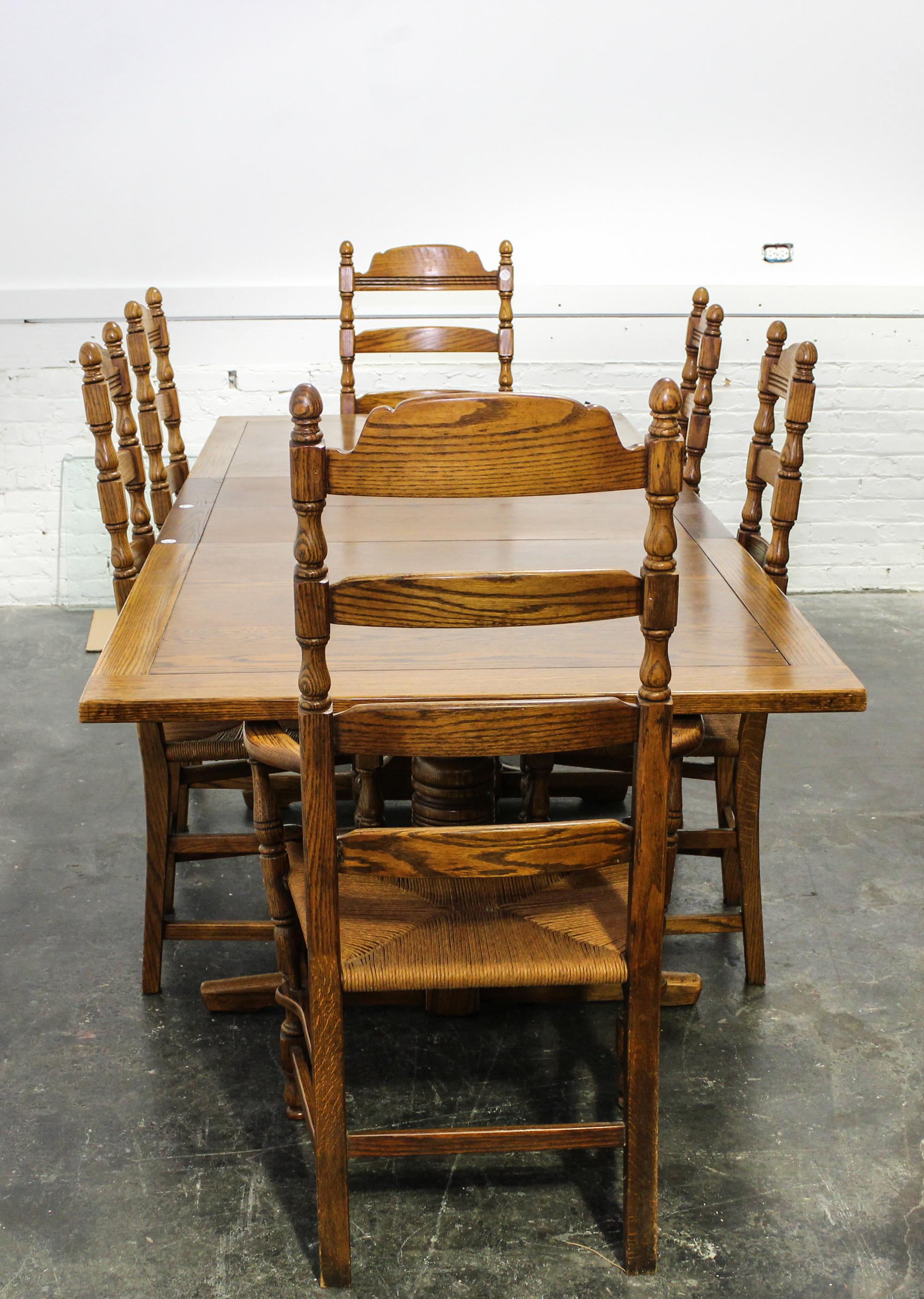 An American Oak Dining Set Height of armchairs 46 inches. — SECOND HALF 20TH CENTURY