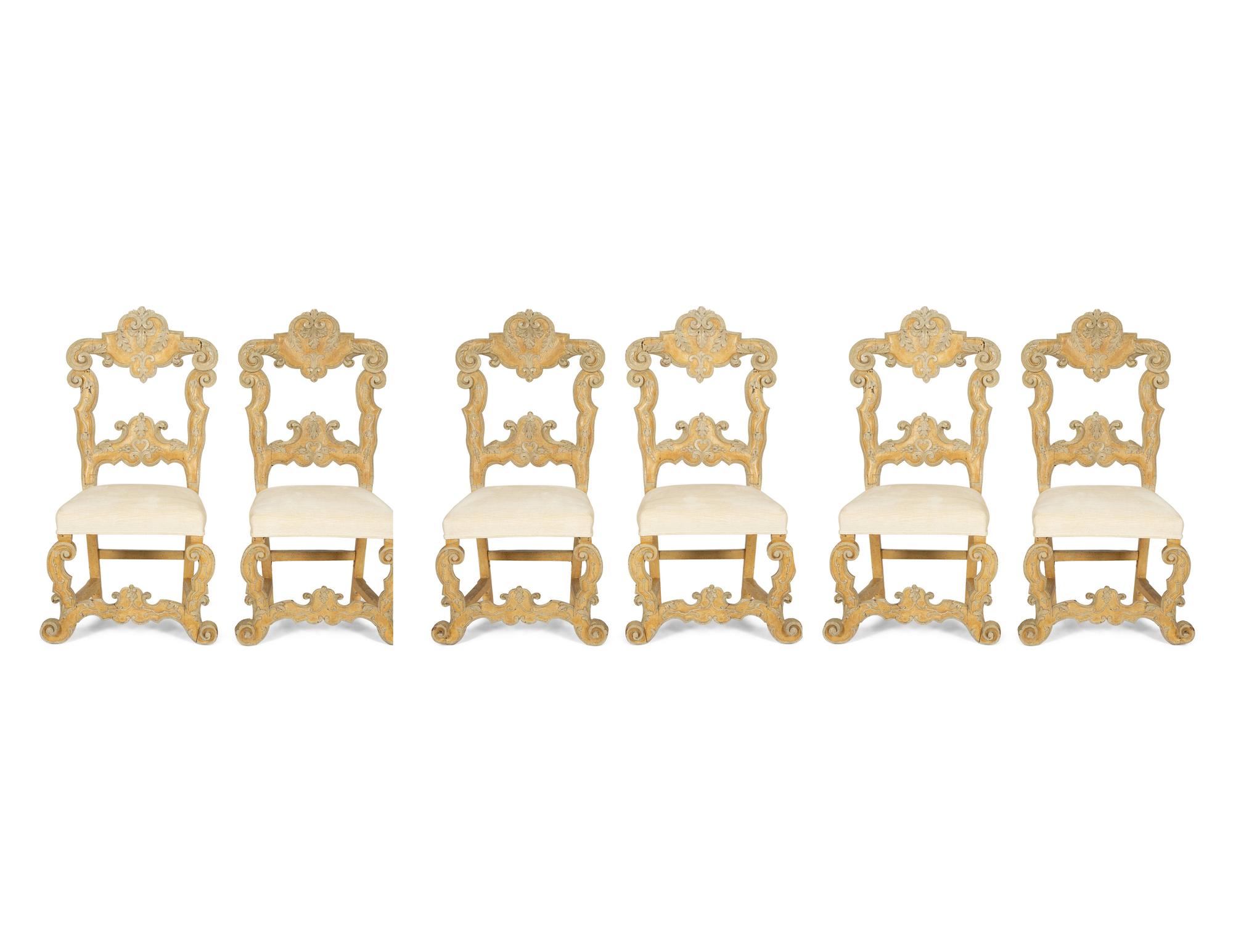 A Set of Six Continental Carved and Cream and Yellow-Painted Dining Chairs