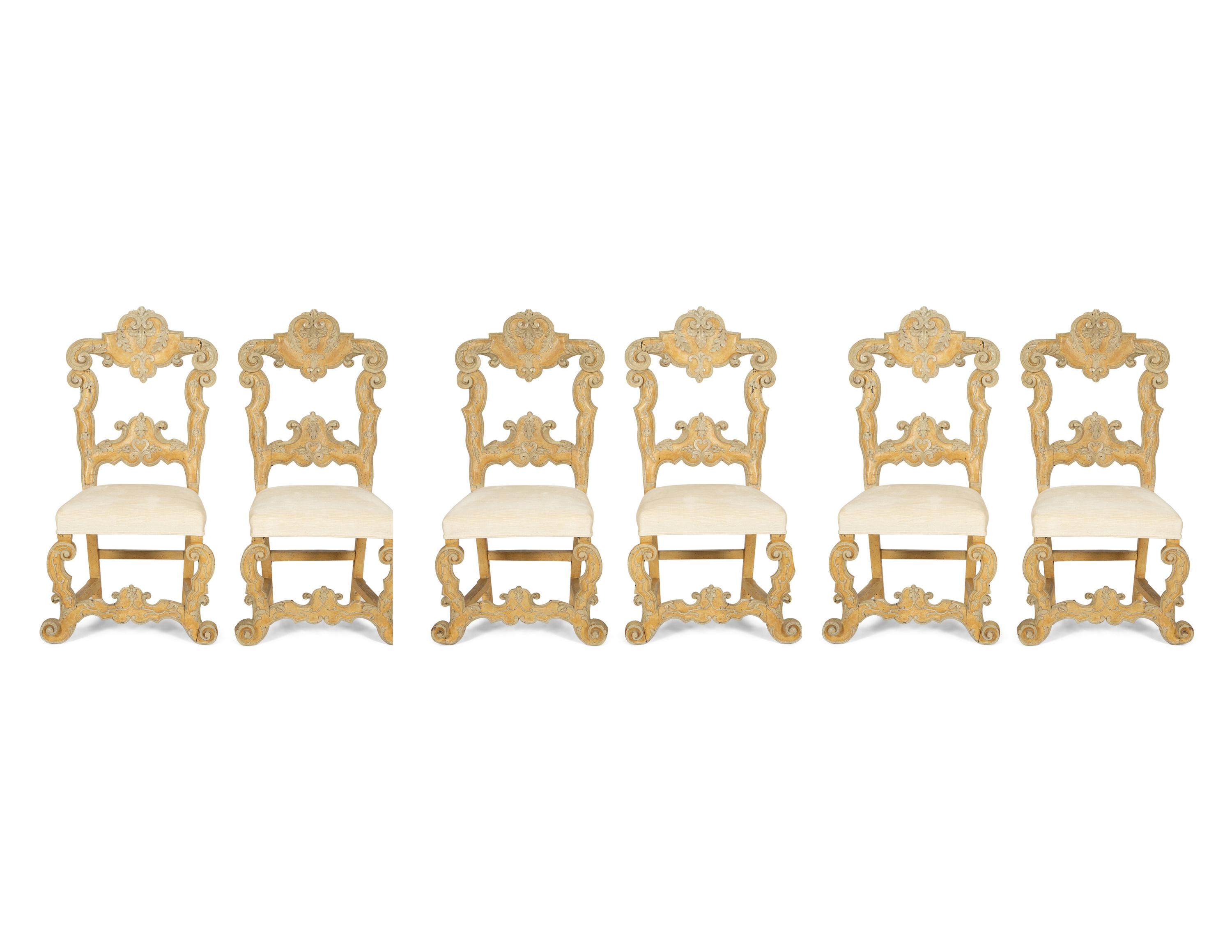 A Set of Six Continental Carved and Cream and Yellow-Painted Dining Chairs