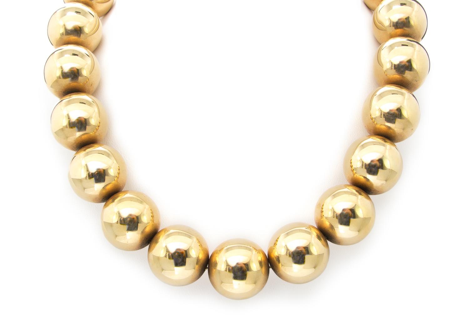 A 14 Karat Yellow Gold Bead Necklace, 53.10 dwts.