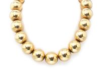 A 14 Karat Yellow Gold Bead Necklace, 53.10 dwts.