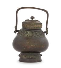 A Chinese Archaistic Bronze Vessel, You Height 8 inches. — MING DYNASTY (1368-1644)