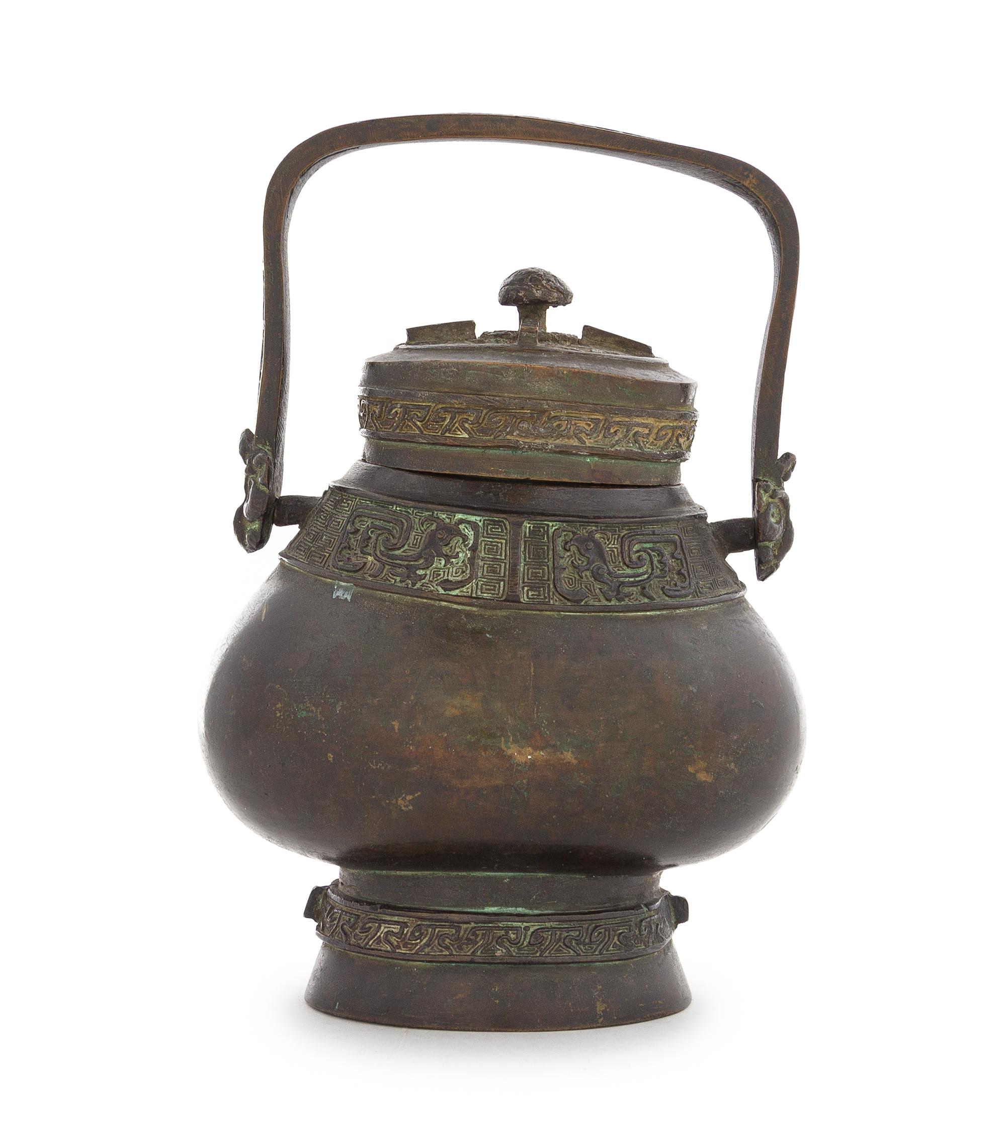 A Chinese Archaistic Bronze Vessel, You Height 8 inches. — MING DYNASTY (1368-1644)