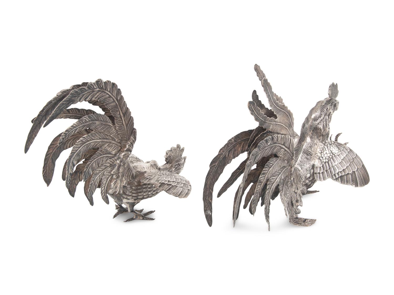 A Pair of German Silver Figures of Fighting Cockerels
