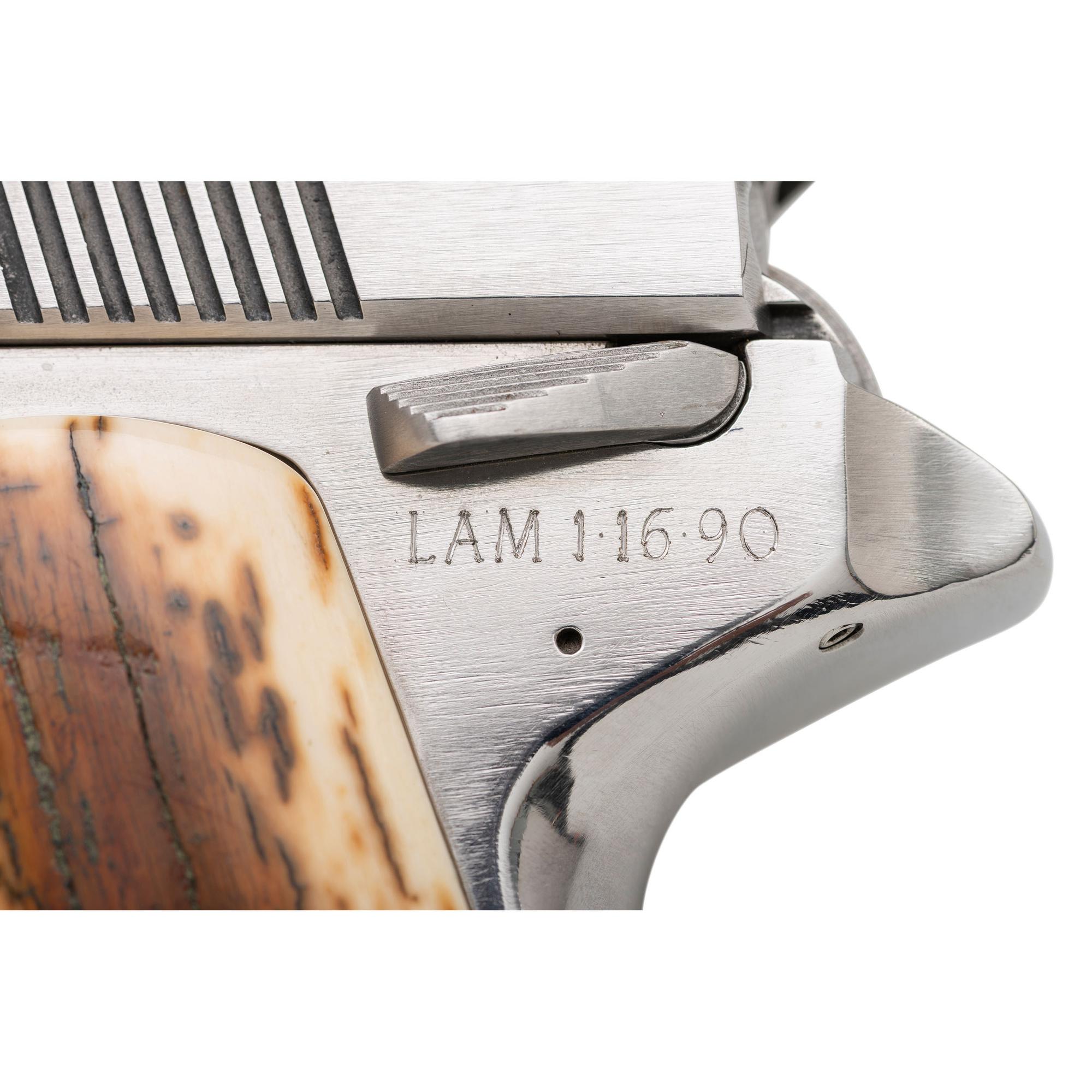 *Wildey Survivor Pistol Presented to Linda Moore with Archive