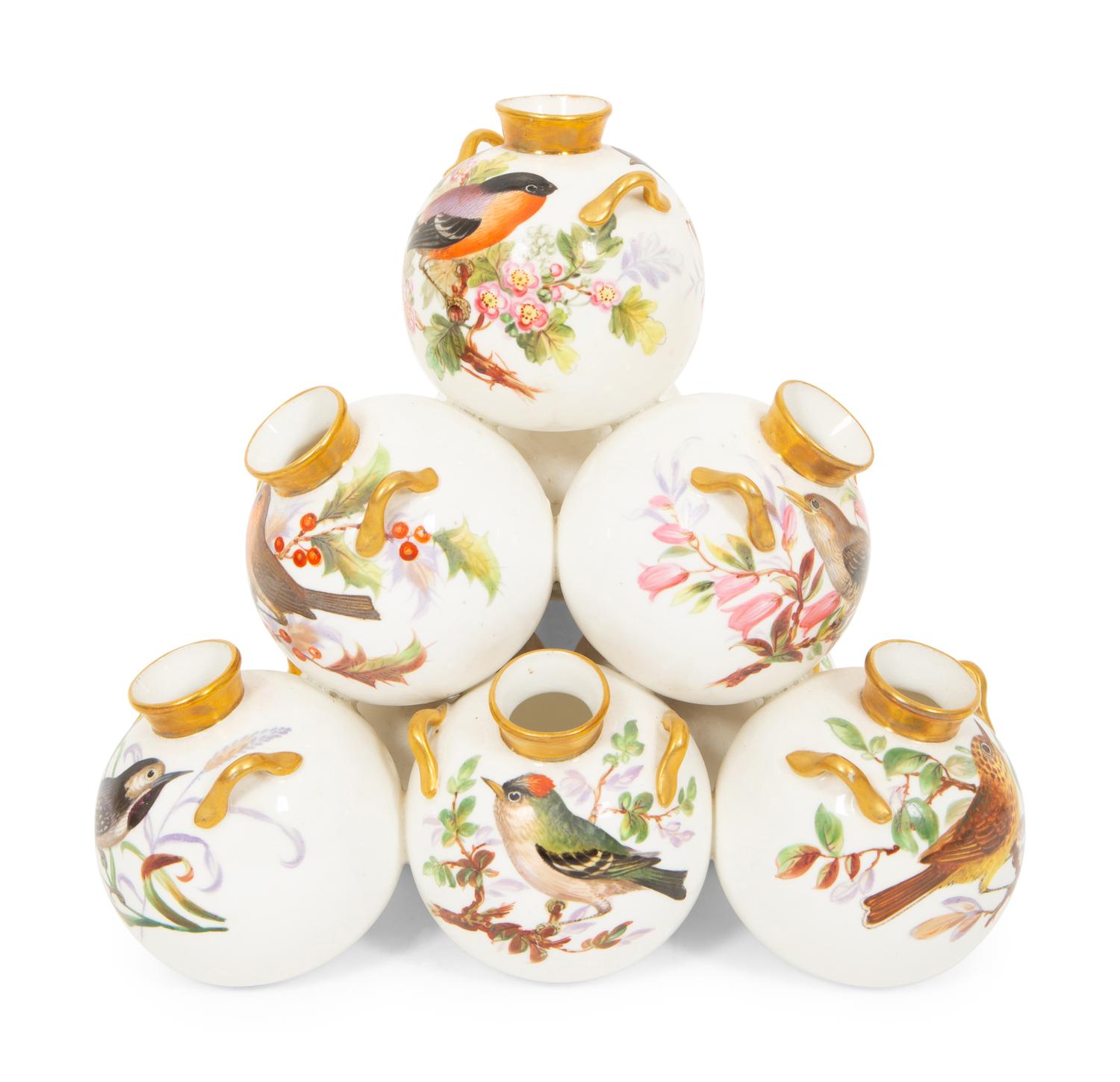 A Royal Worcester Porcelain Multi-stack of Ten Vases with Hand Painted Bird Decoration