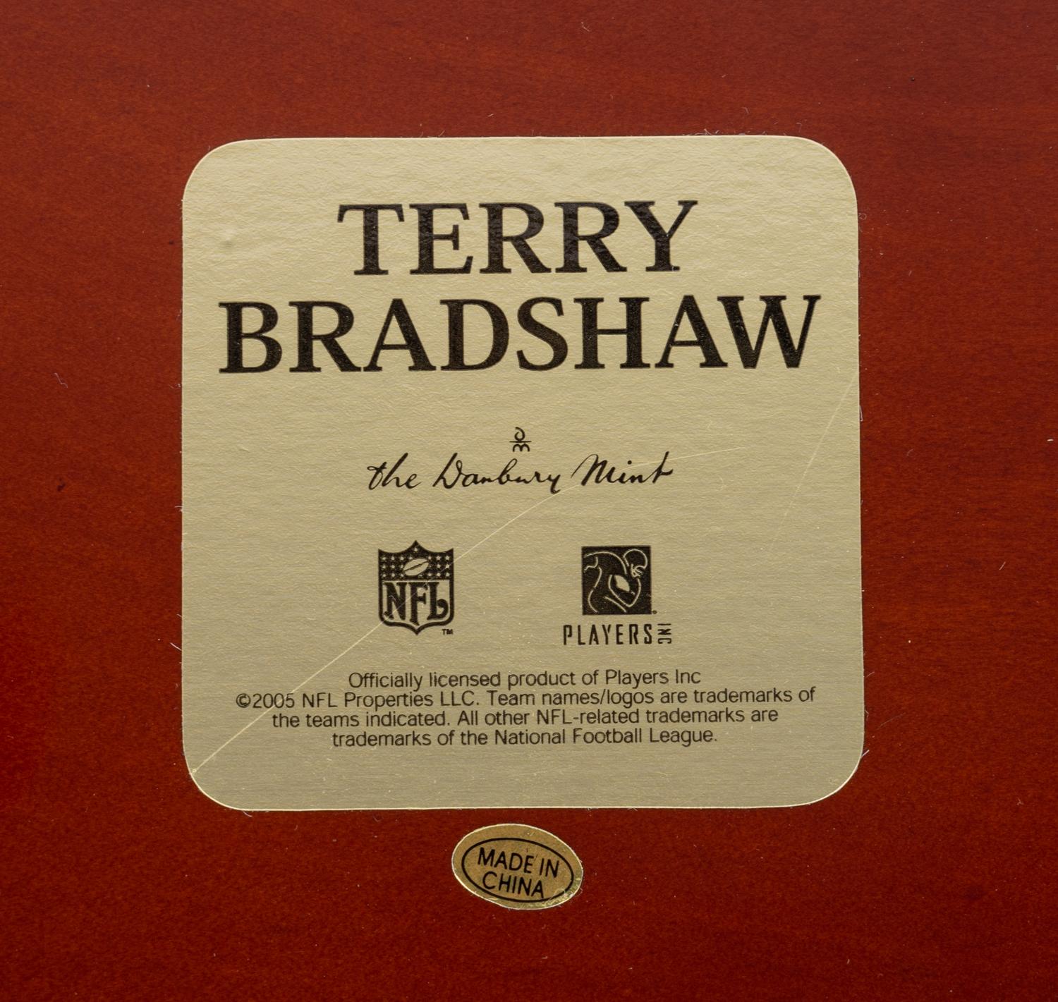 A Terry Bradshaw Pittsburgh Steelers Danbury Mint Figurine Display,