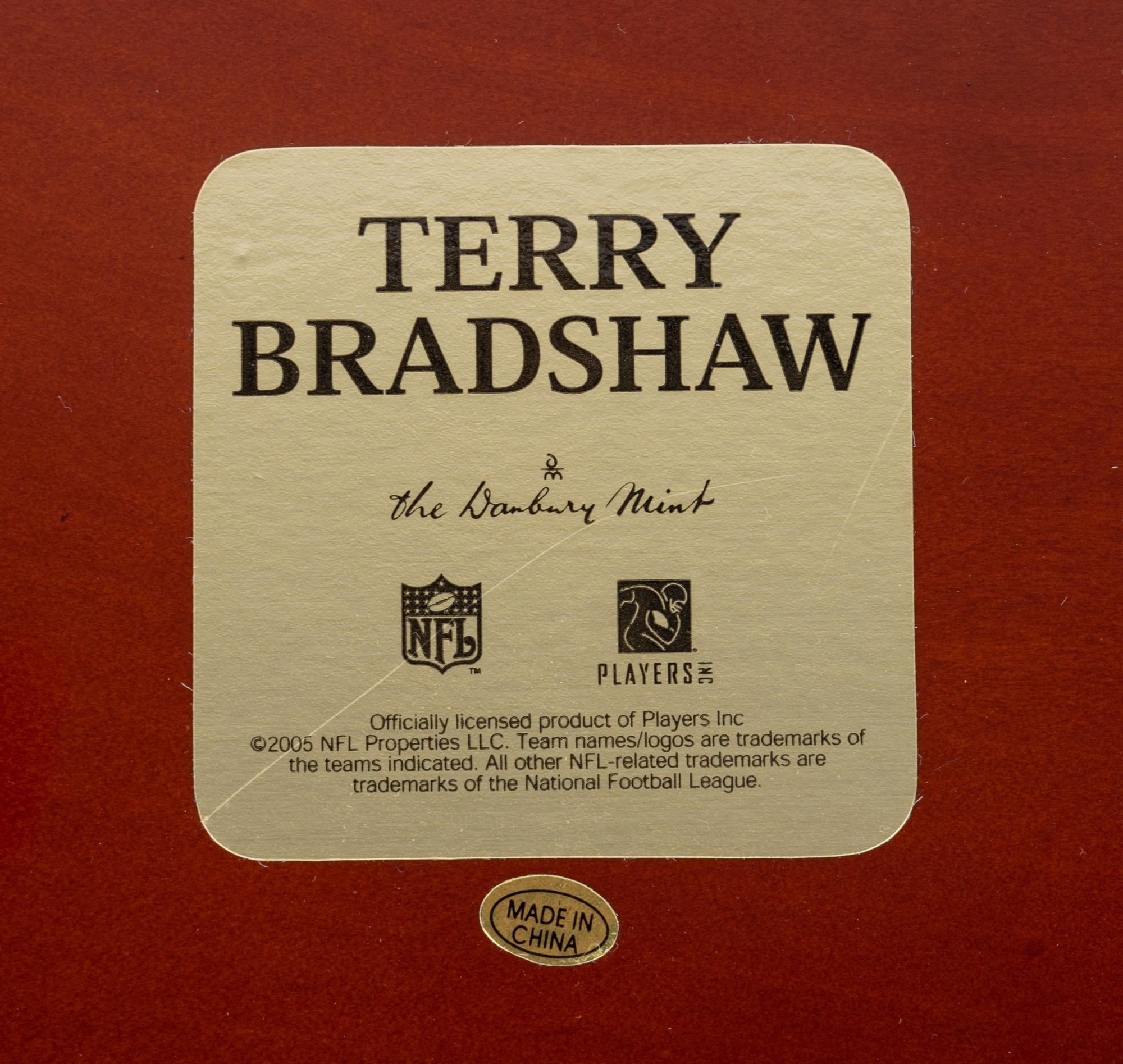 A Terry Bradshaw Pittsburgh Steelers Danbury Mint Figurine Display,