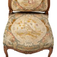 A Suite of Louis XV-Style Carved Walnut Needlework Upholstered Seating Furniture