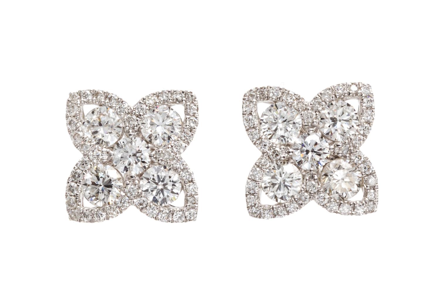 A Pair of 18 Karat White Gold and Diamond Cluster Earrings, 1.80 dwts.