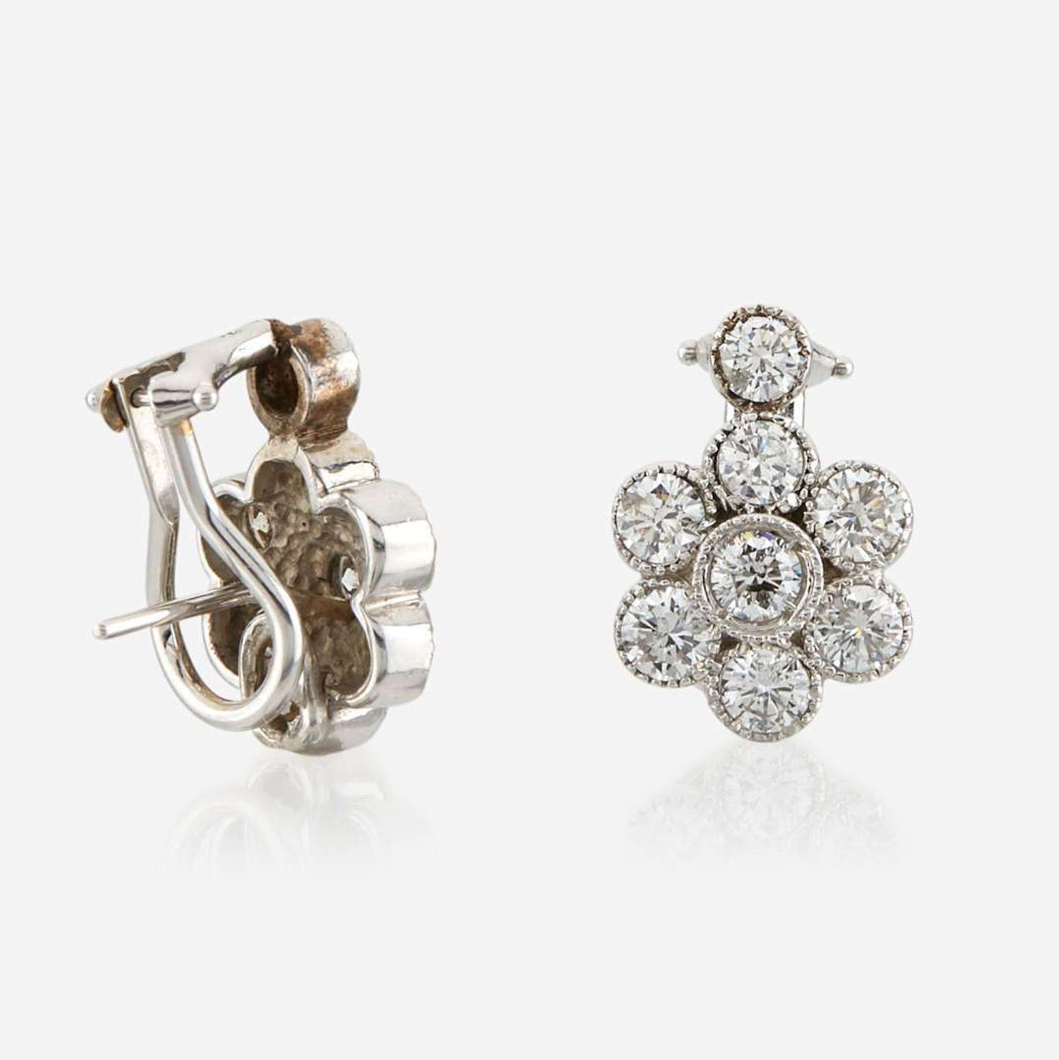 A pair of diamond and white gold earrings