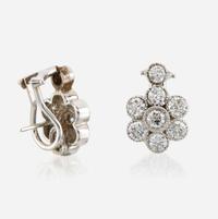 A pair of diamond and white gold earrings