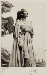 CALLAS, Maria (1923-1977). Black and white photographic portrait, signed (“Maria Meneghini Callas”), 1957.
