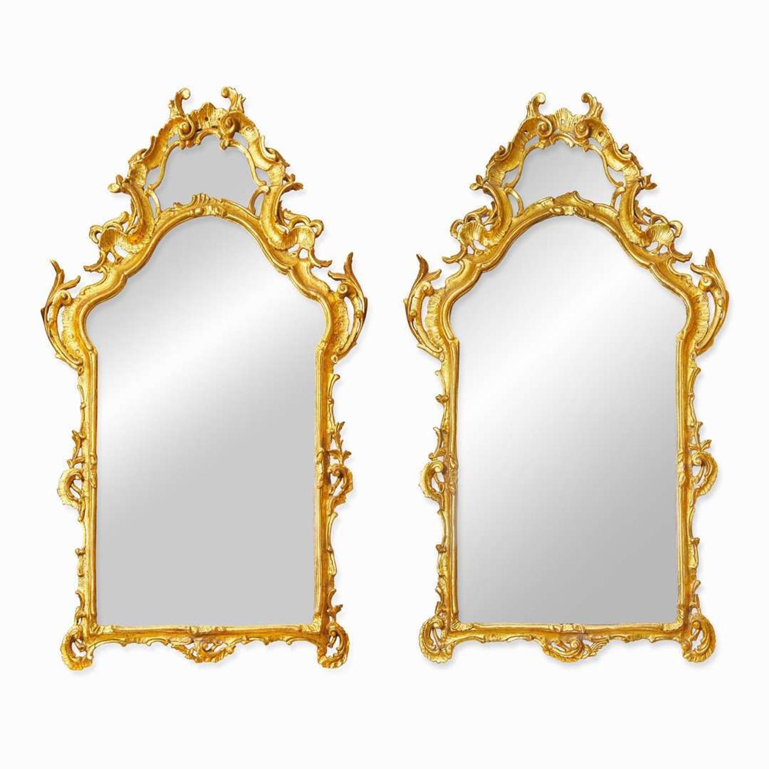 A large pair of Italian Rococo giltwood mirrors 19th / 20th century