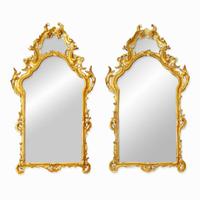 A large pair of Italian Rococo giltwood mirrors 19th / 20th century