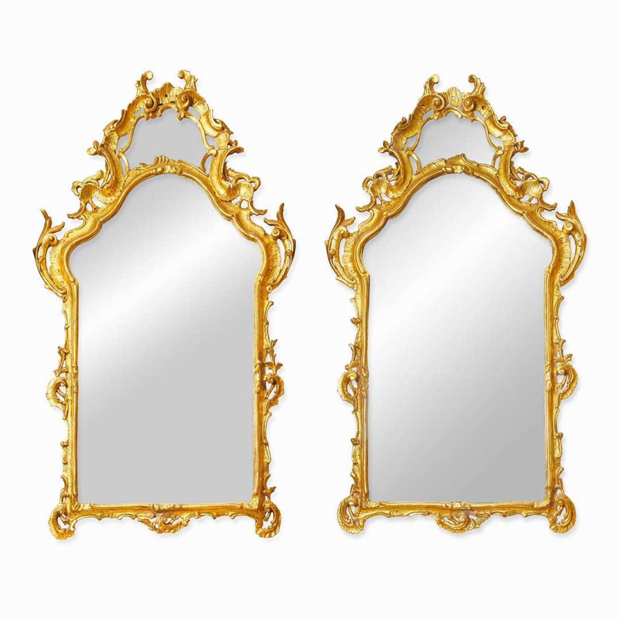 A large pair of Italian Rococo giltwood mirrors 19th / 20th century
