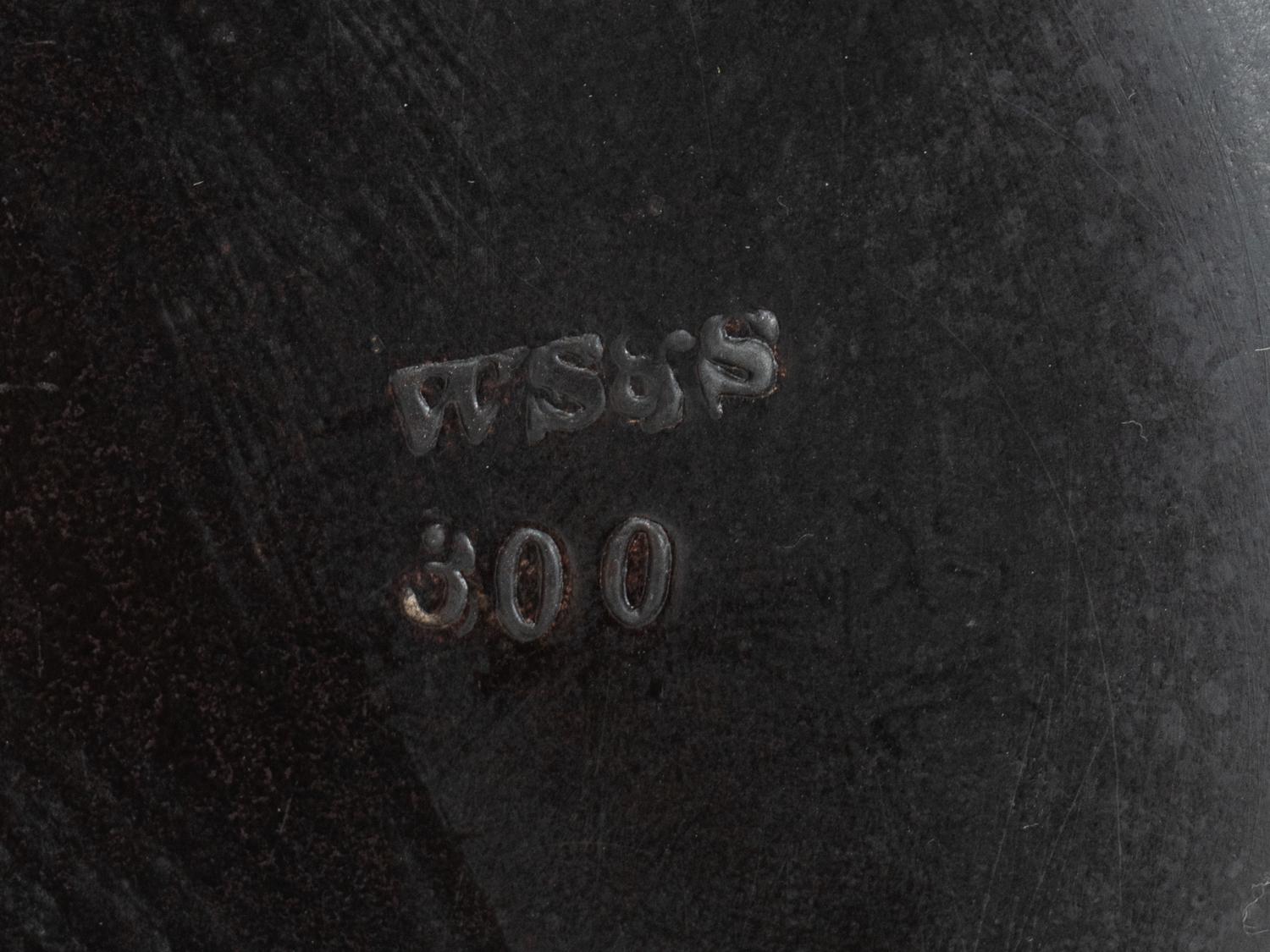 A Neoclassical Black Glazed Composition Vase