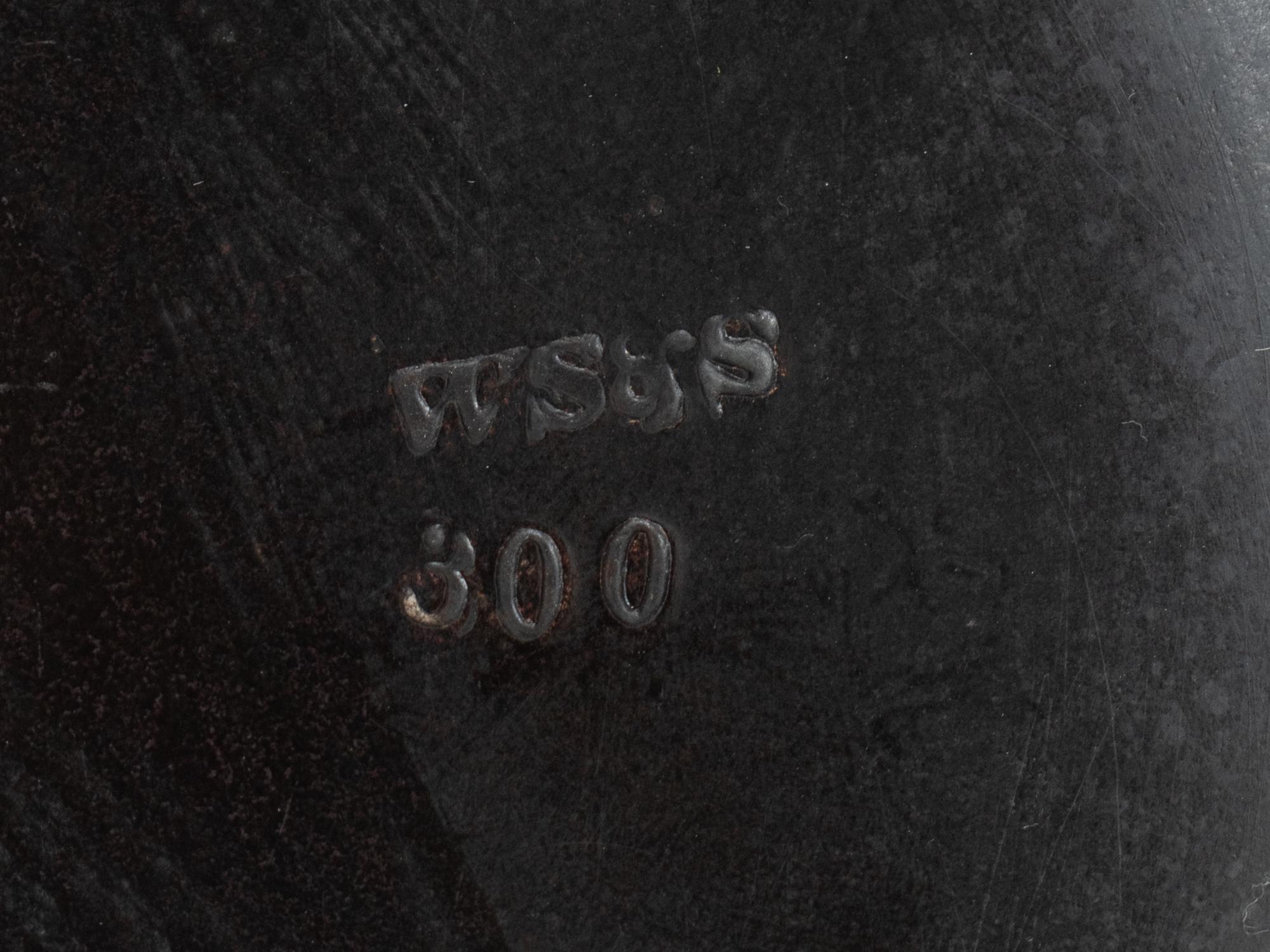 A Neoclassical Black Glazed Composition Vase