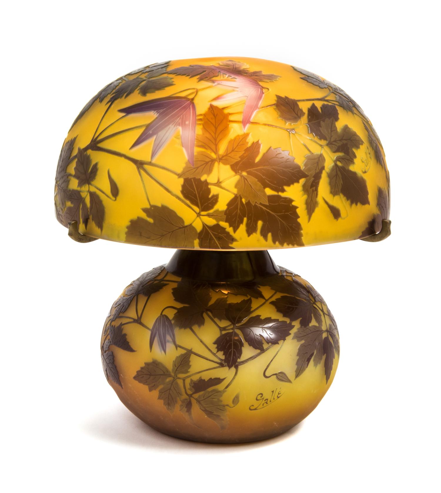 Emile Galle, (French, 1846-1904), an Alpina Clematis cameo glass lamp, the shade and base with conforming leafy decoration