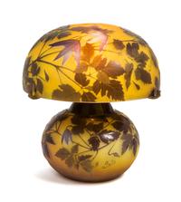 Emile Galle, (French, 1846-1904), an Alpina Clematis cameo glass lamp, the shade and base with conforming leafy decoration