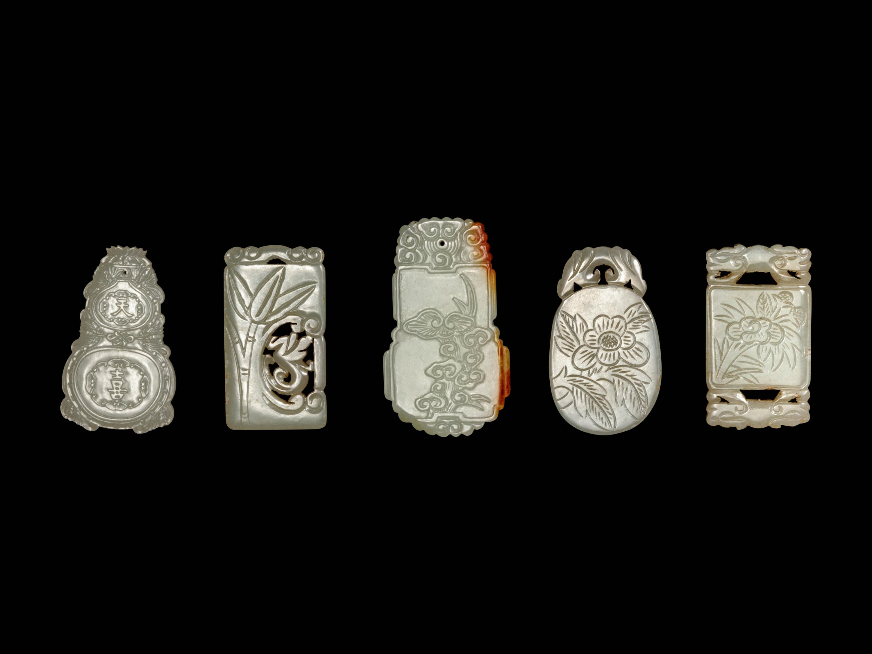 Five Chinese White and Pale Celadon Jade Plaques