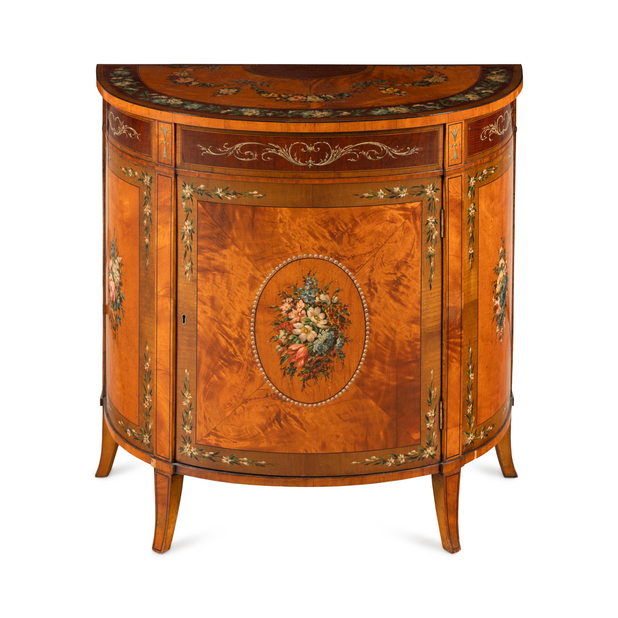An Edwardian Mahogany, Satinwood and Polychrome Painted Demilune Cabinet