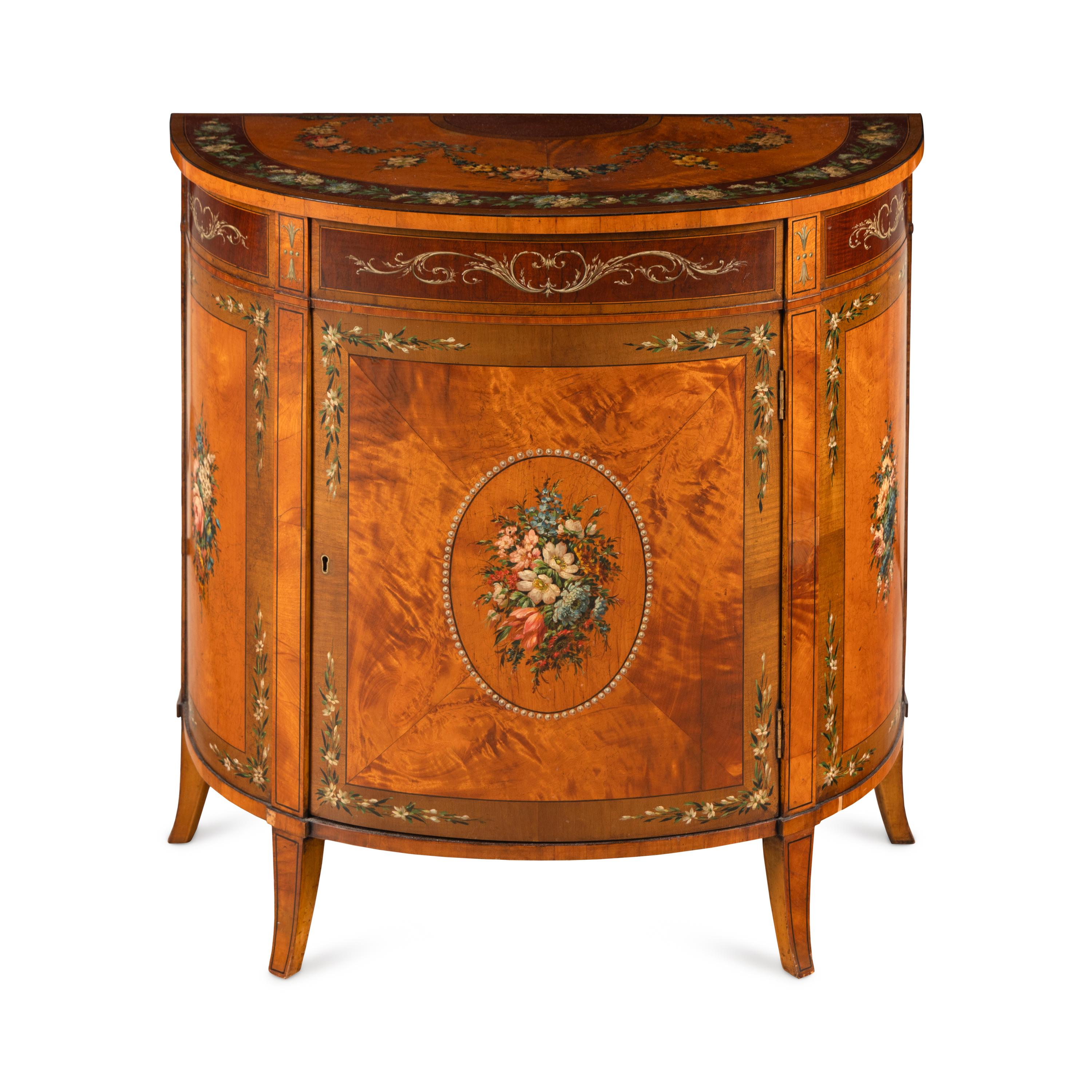 An Edwardian Mahogany, Satinwood and Polychrome Painted Demilune Cabinet
