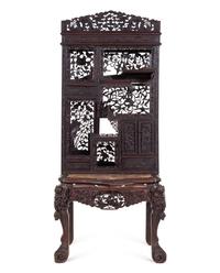 A Chinese Export Carved Hardwood Displaying Cabinet and Desk
