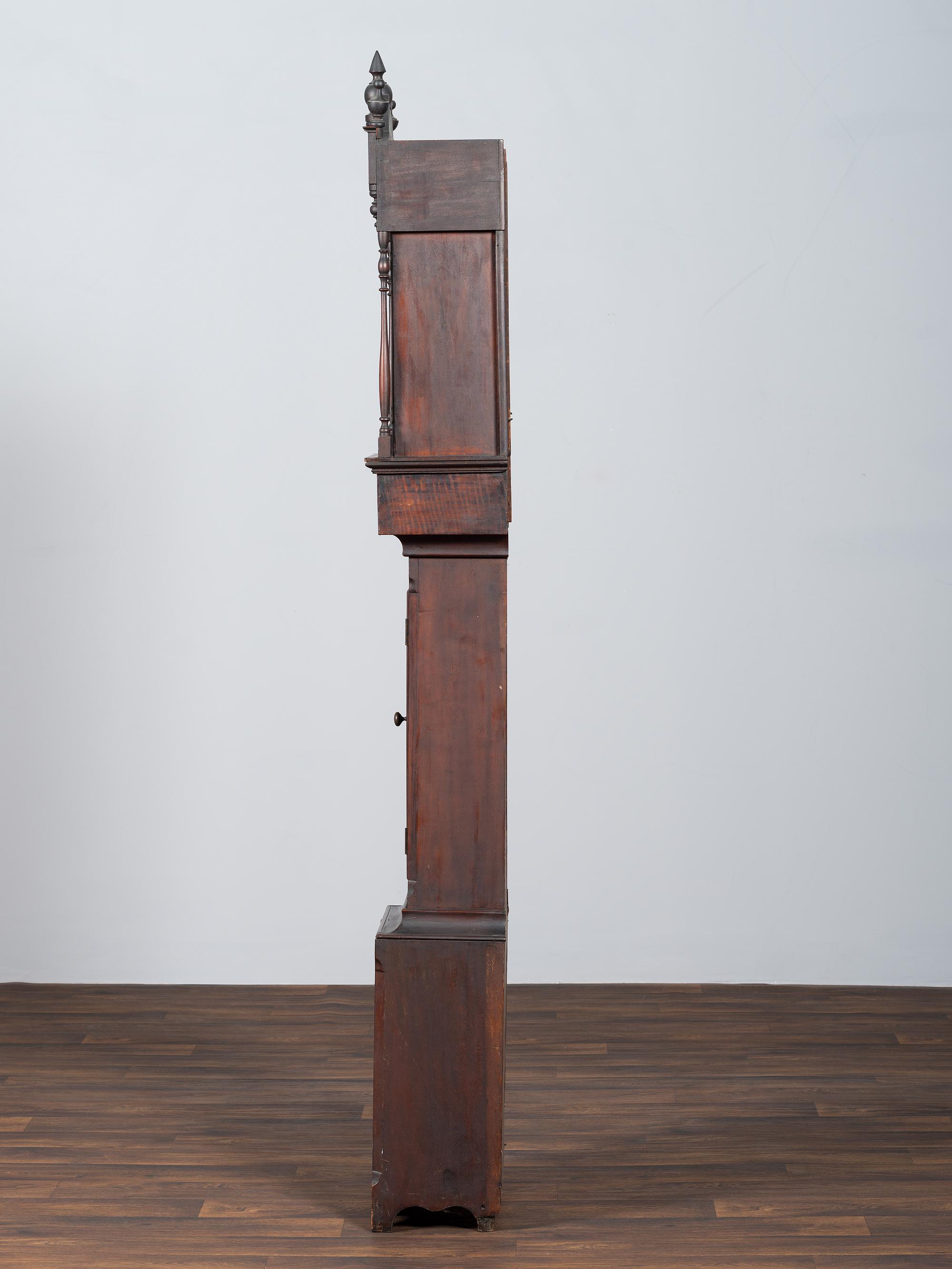 A Chippendale Cherrywood and Tiger Maple Tall Case Clock