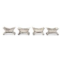 A Set of Four Aesthetic Movement Hammered Sterling Silver Salt Cellars