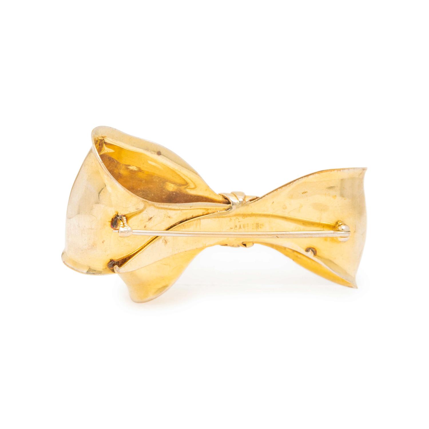 YELLOW GOLD, DIAMOND AND RUBY BOW BROOCH