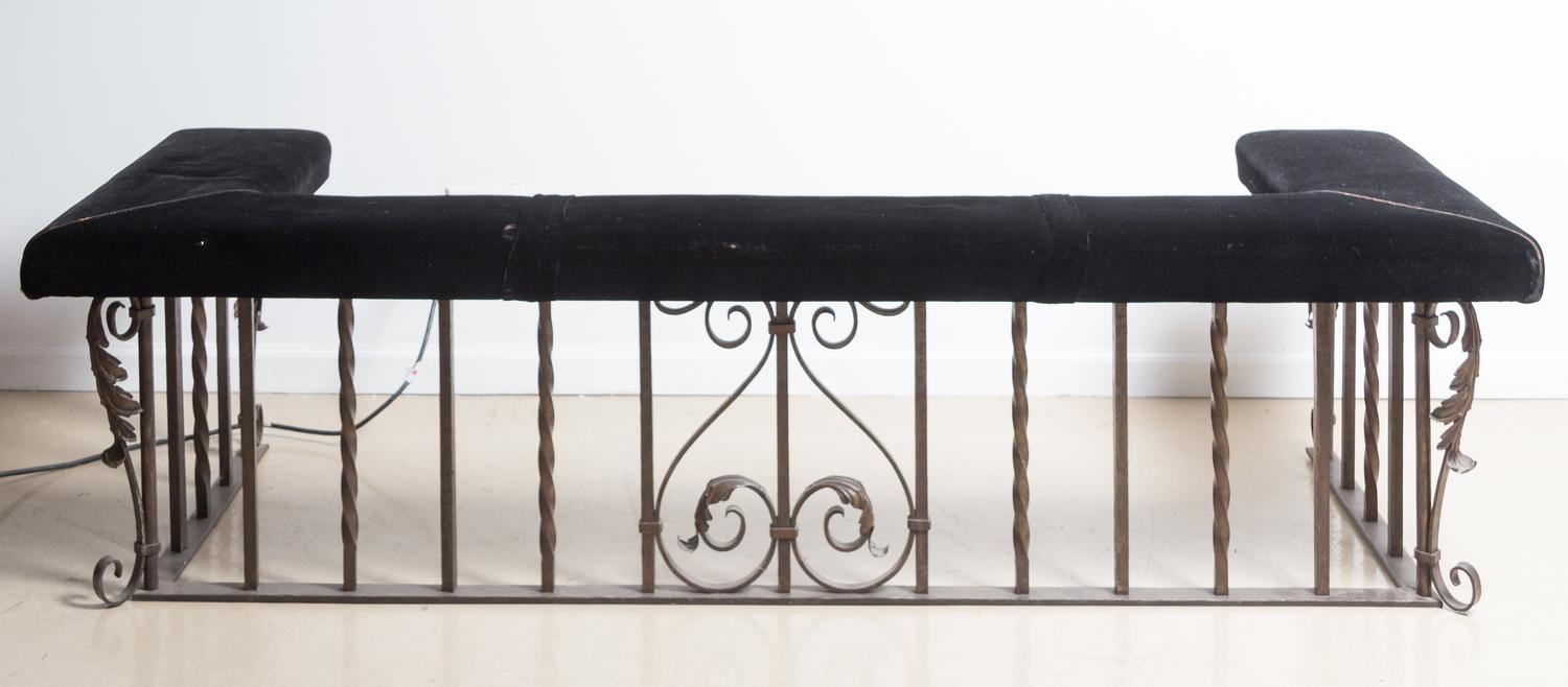 A Wrought Iron Club Fire Fender Height 19 1/2 x width 70 x depth 26 1/4 inches.