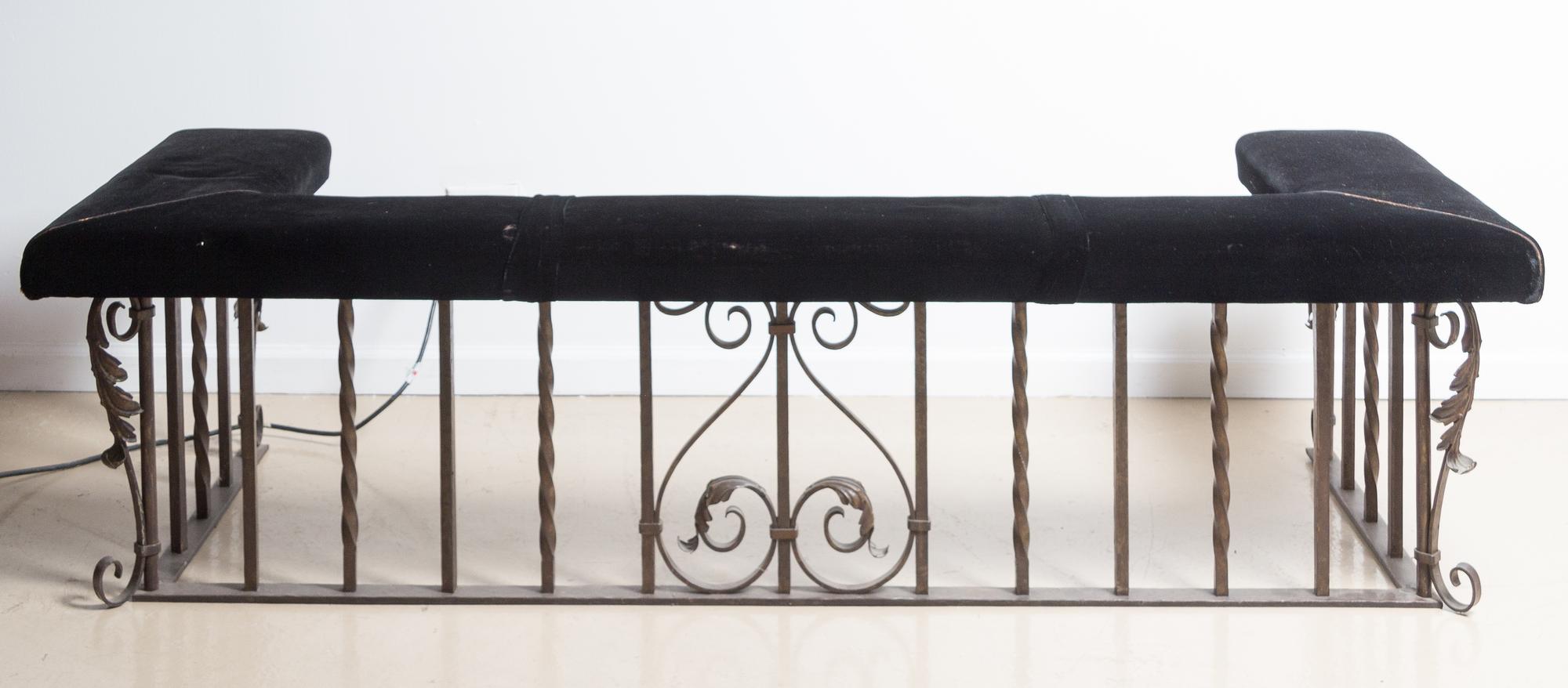 A Wrought Iron Club Fire Fender Height 19 1/2 x width 70 x depth 26 1/4 inches.