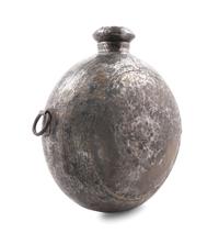 A Large Indonesian Hammered Metal Vessel