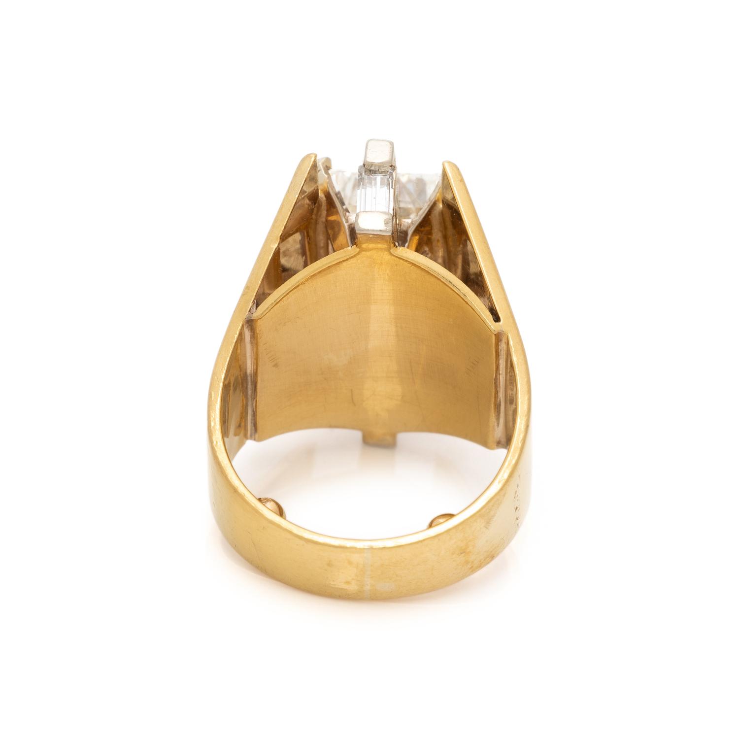 EMERALD CUT DIAMOND AND YELLOW GOLD RING