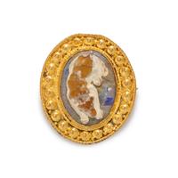 A Roman Gold and Glass Cameo Brooch with a Sleeping Dog