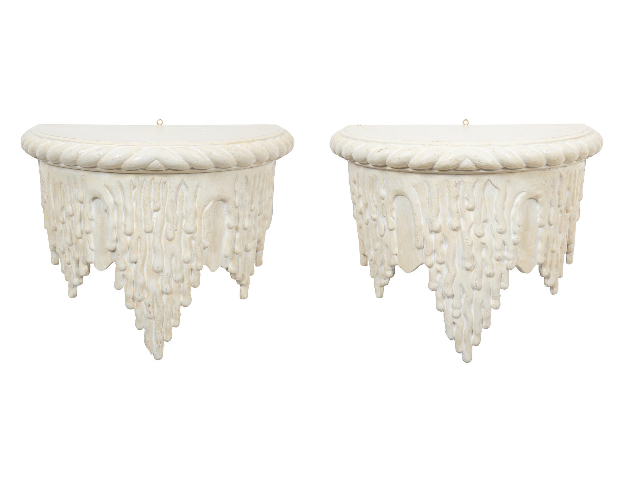 A Pair of White Painted Grotto Style Wall Brackets