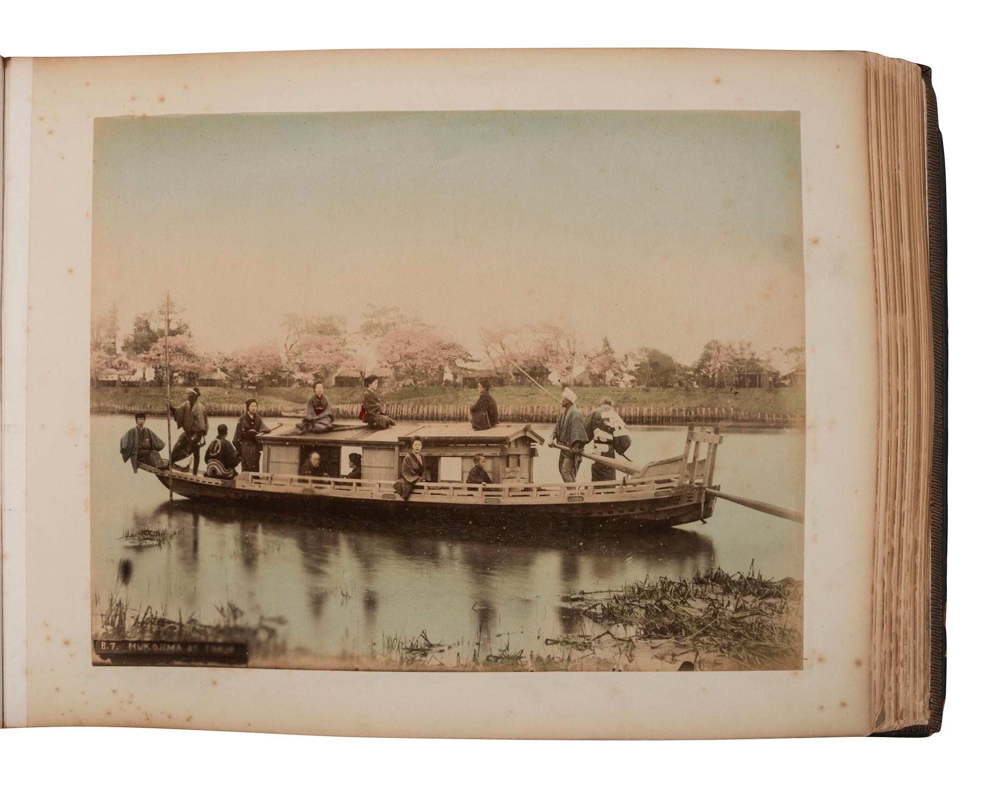 [EARLY PHOTOGRAPHY]. Album containing 50 hand-colored photographs of Japan.