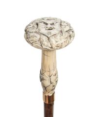 A Japanese Ivory Handled Cane, Length of handle 4 x length overall 36 1/2 inches.