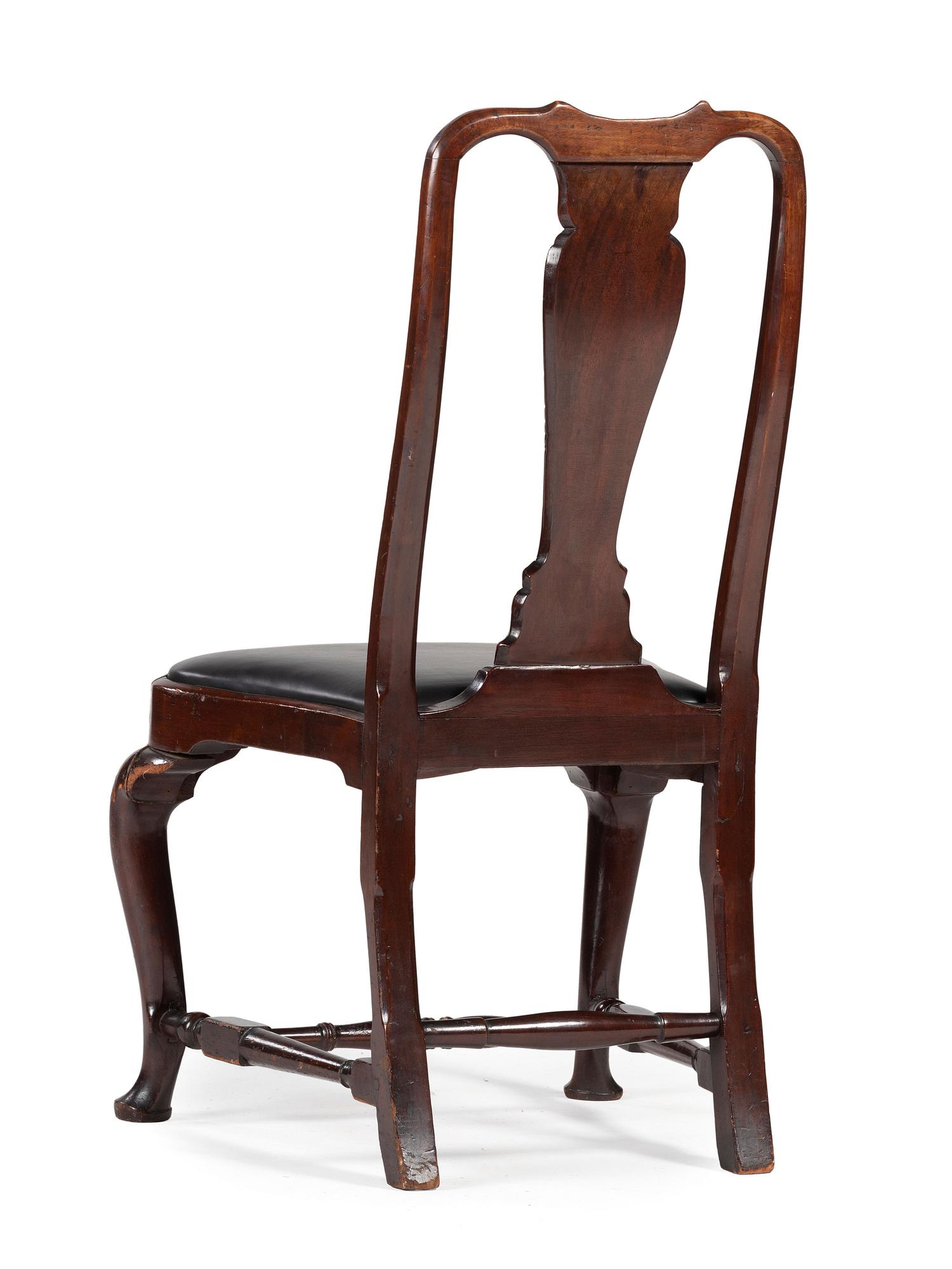 A Queen Anne Carved Walnut Compass-Seat Stretcher-Base Side Chair
