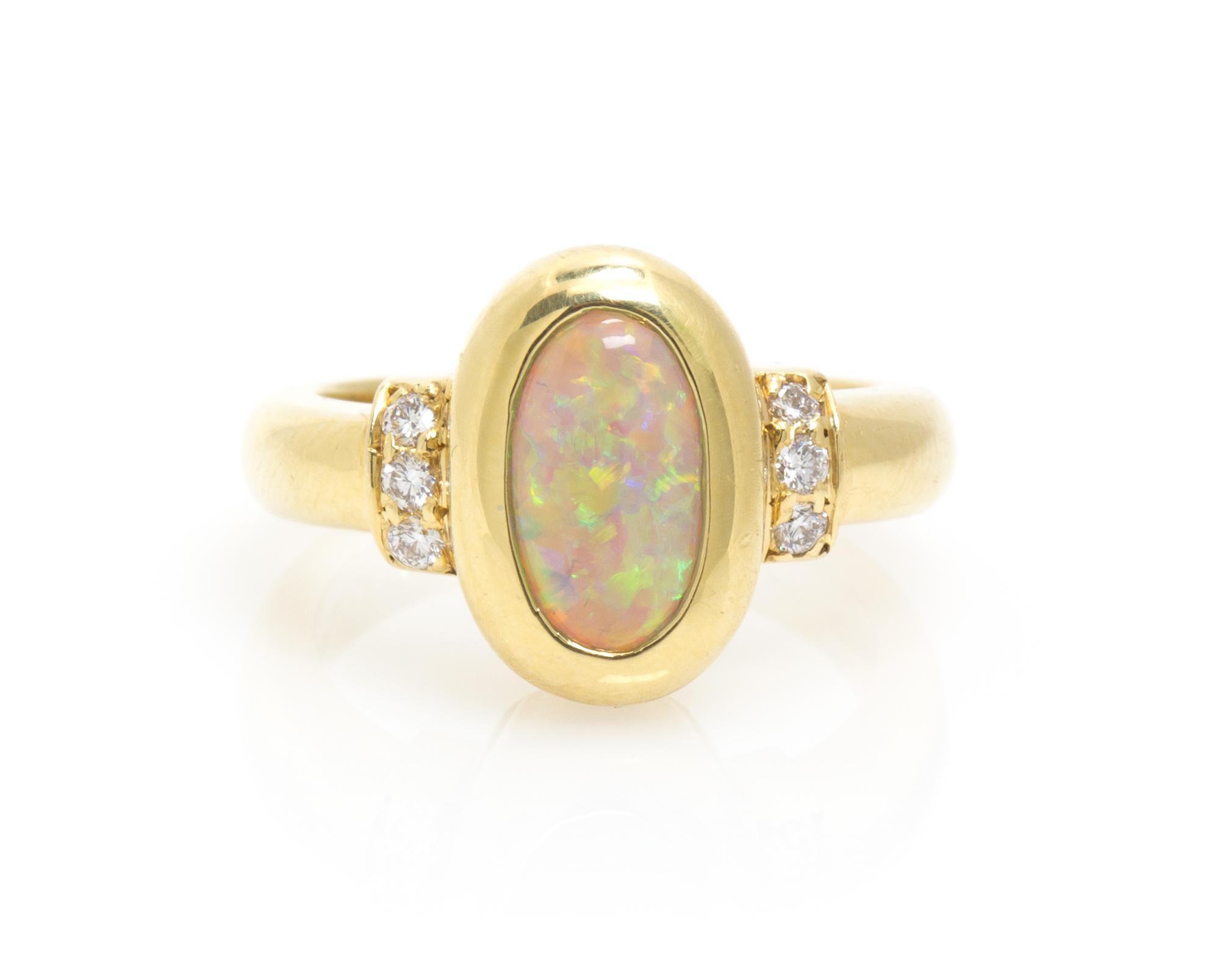 An 18 Karat Yellow Gold, Opal and Diamond Ring, 5.90 dwts.