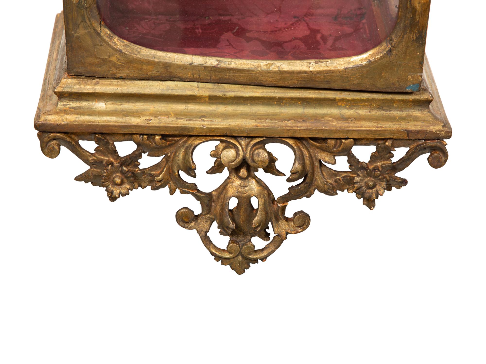 An Italian Carved Giltwood Reliquary Cabinet