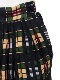 Five Pairs of Designer Pants: One Yves Saint Laurent, One Christian Dior, Two Chanel, and One Dolce & Gabbana, 1980-2000s